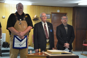 The Grand Master being presented to the Lodge by Past Master Allan Dover along with Treasurer Jason Porter.