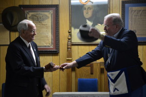 Worshipful Master Danny Fisher passing the gavel to Grand Master Fred Bean.